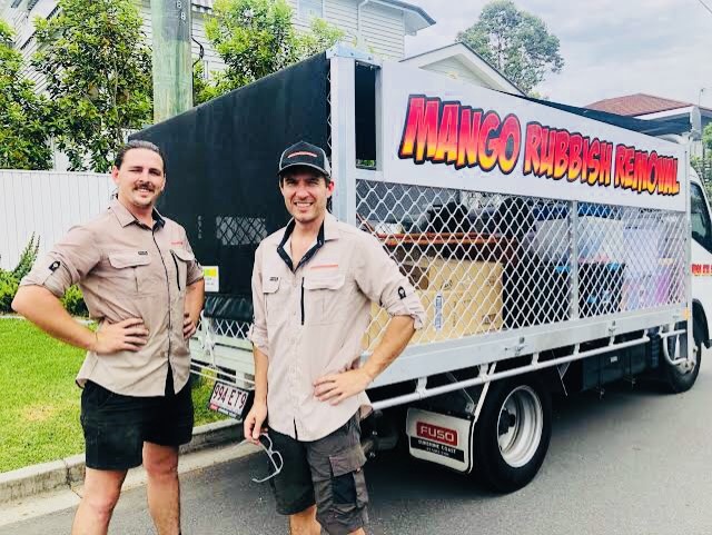 two men at a job site about to carry out a rubbish removal service